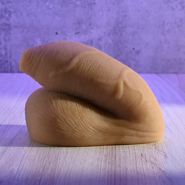 The Uncircumcised Packer Medium Tone Evolved Novelties Female Sex Toys